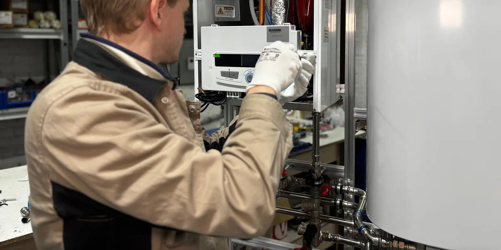 Water heater installation in Miami: technician servicing a heater