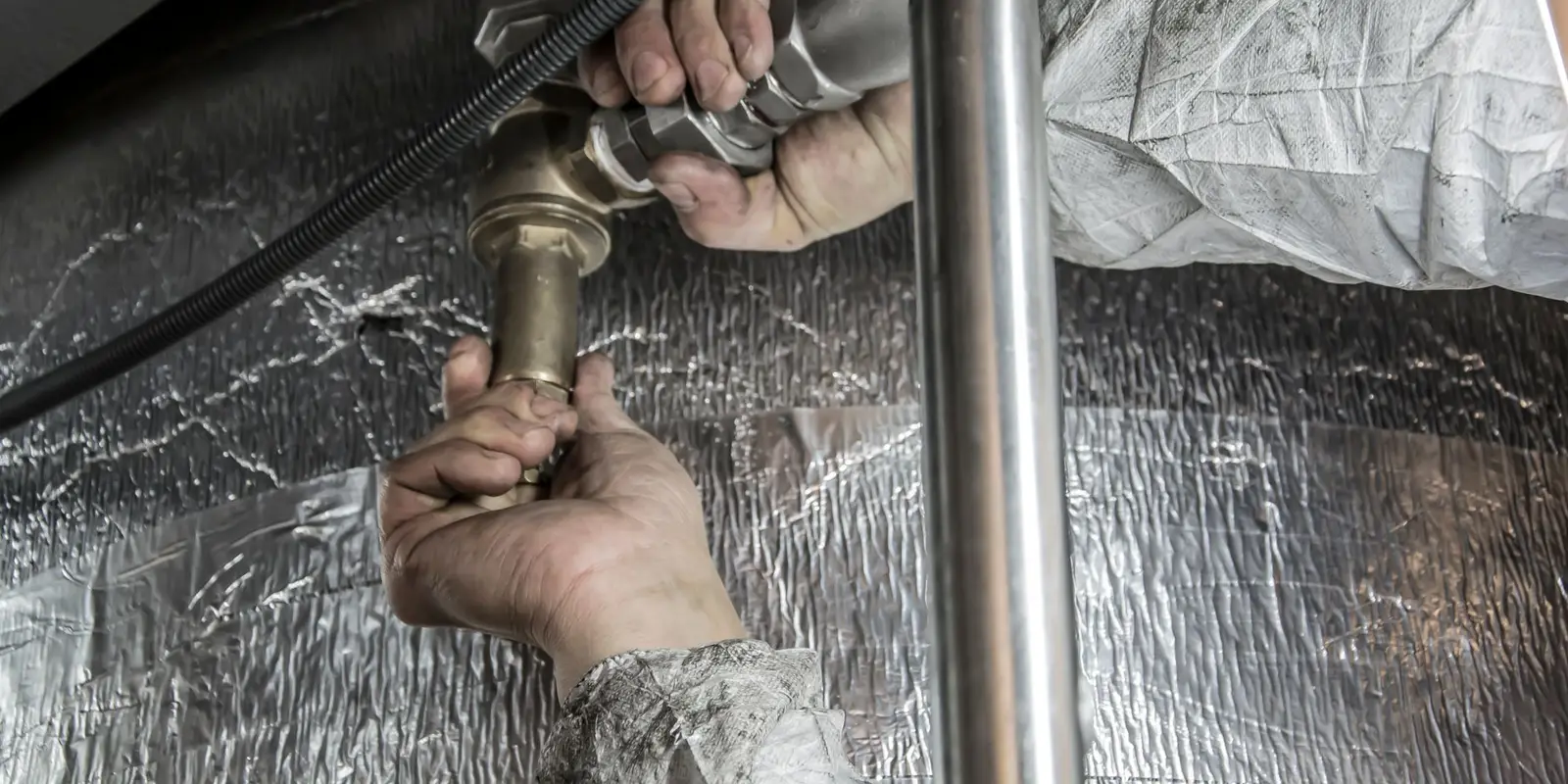 Water heater service in Miami: plumber fitting supply pipes